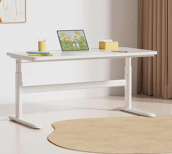 White standing desk frame in a minimalist interior, highlighting DELTA CAINA's sleek and functional furniture hardware designs for modern and ergonomic workspaces.